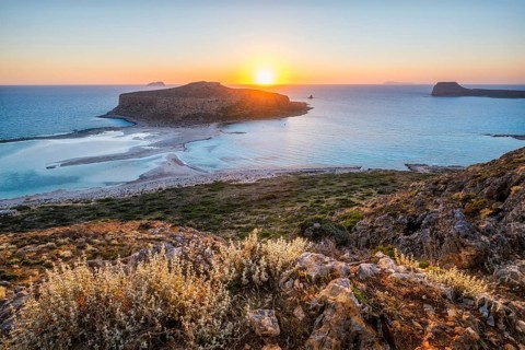 Island Gramvousa and the beautiful Balos beach on sunset in Crete island