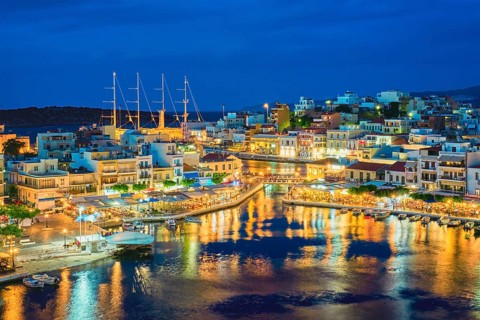 Beautiful Agios Nikolaos town on lake Voulismeni at night