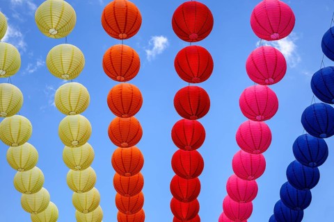 Colourful lanterns strung across the street