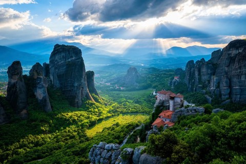 Sunset over monastery of Rousanou and Monastery of St