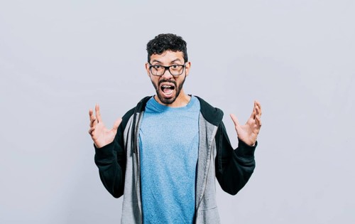 Angry people shouting up with open hands