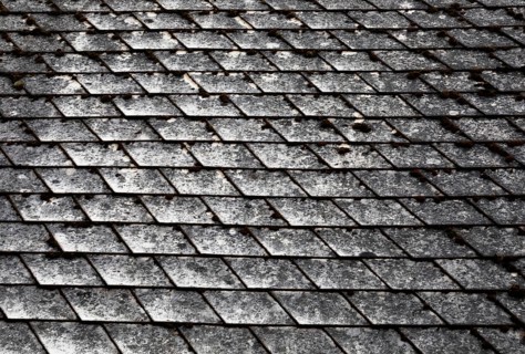 Old mossy and weathered house roof