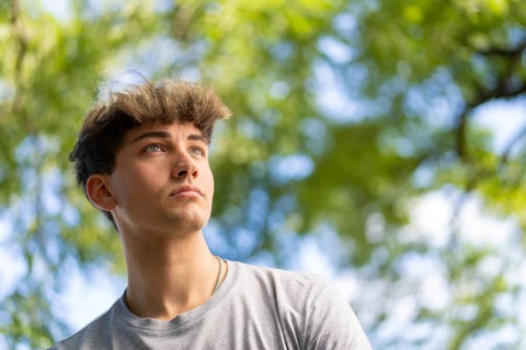 Confident young blonde man portrait