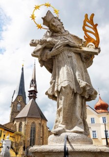 Nepomuk statue on the main square with town parish church