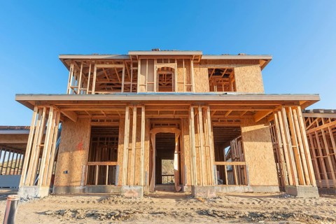 New wood house framing at construction site