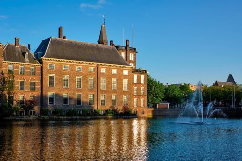 View of the Binnenhof House of Parliament and the Hofvijver lake. The Hague