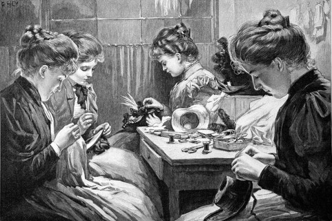 Four women doing needlework in the living room