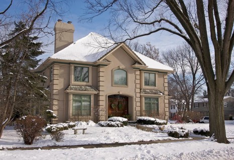 Majestic newly constructed home facade on a blustery day
