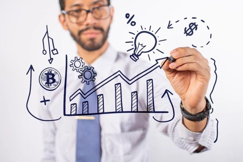 Business man drawing finance