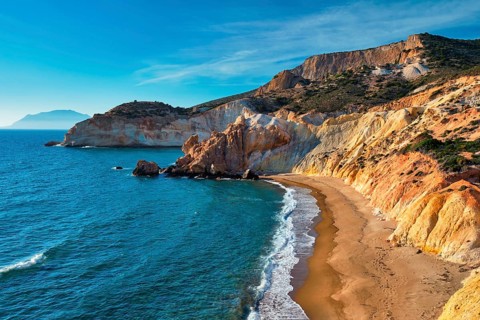 Agios Ioannis greek beach and Aegean sea on sunset