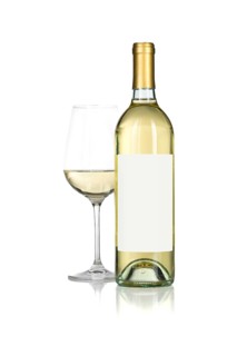 Wine glass and bottle with blank label ready for graphic and text isolated on white