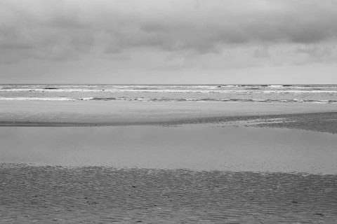 Wellen und Priele an der Nordseekueste