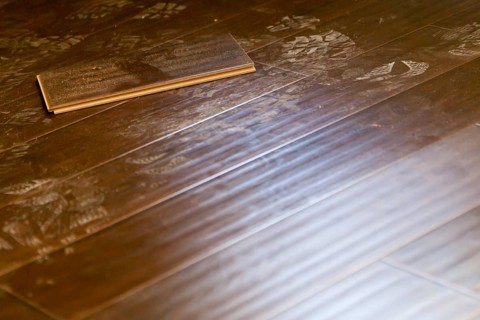 Newly installed dusty brown laminate flooring abstract