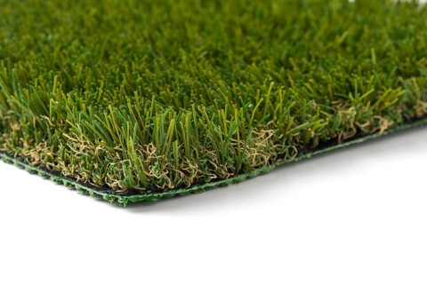 Section of artificial turf grass on white background