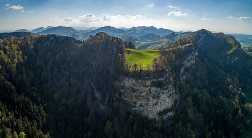 Clearing and escarpment at the Geissflue
