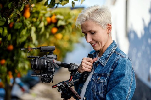 Camera operator with movie setup including a gimbal