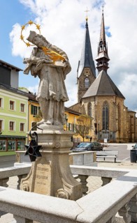 Nepomuk statue on the main square with town parish church
