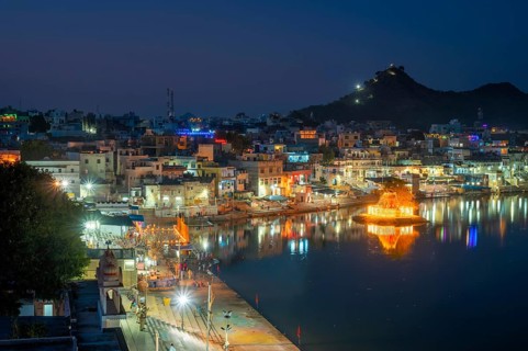 View of famous indian hinduism pilgrimage town sacred holy hindu religious city Pushkar with Brahma temple