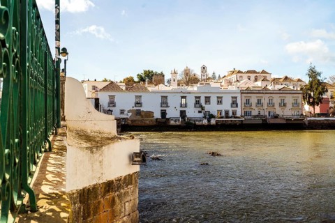 Beautiful cityscape of historic Tavira by Gilao river