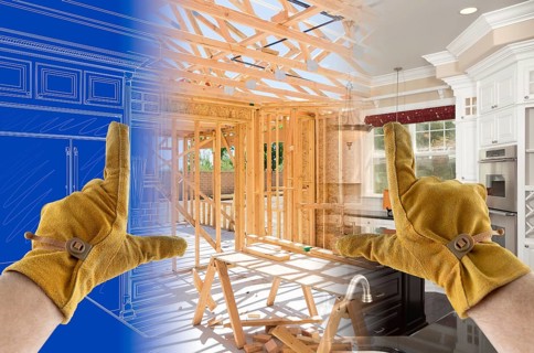 Framing hands with gloves over kitchen drawing
