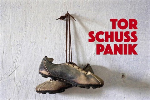 Hanging football boots on the nail