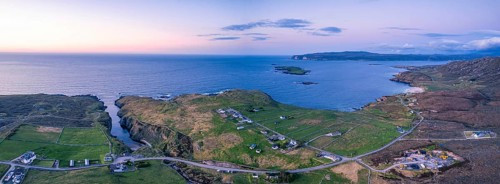 Panorama over Geodha Smoo and Smoo Cave Cliffs from a drone
