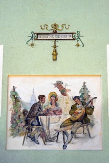 Mural with drinking scene and Cupid