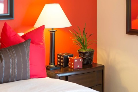 Detail of bedroom nightstand and decorations
