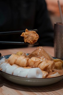 Sticks of steamed dumplings and rice noodle rolls at a Cantonese restaurant in Macau