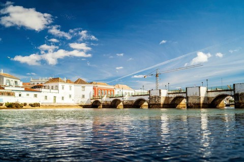 Beautiful cityscape of historic Tavira by Gilao river