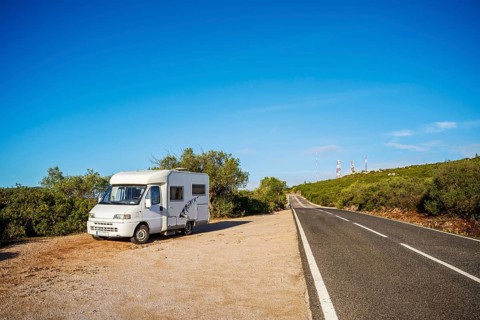 RV parked next to the road in the beautiful Natural Park of Arrabida