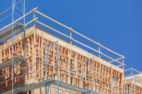 Scaffolding and wood framing at construction site