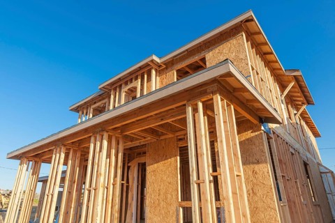 New wood house framing at construction site
