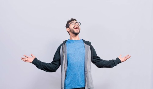 Desperate and angry person shouting with open arms