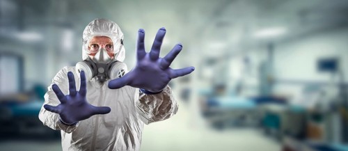 Man wearing hazmat suit