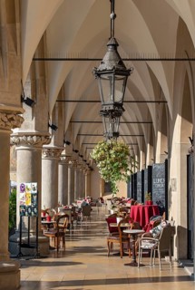 Cafe at arcades of Sukiennice Cloth Hall