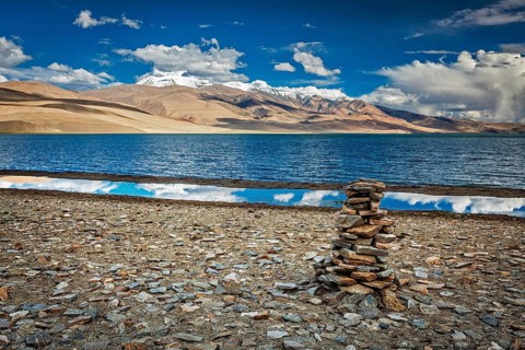 Stone cairn at Himalayan lake Tso Moriri