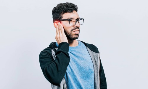 Person with ear pain