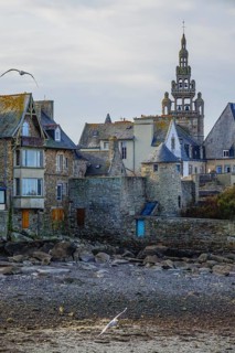 Old town of Roscoff with church Notre-Dame-de-Croaz-Batz at low tide