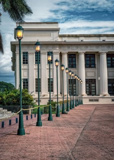 Image of several lit lantern poles