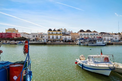 Beautiful cityscape of historic Tavira by Gilao river