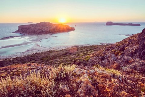 Island Gramvousa and the beautiful Balos beach on sunset in Crete island