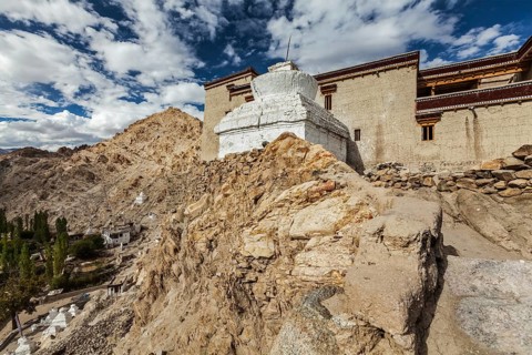 Shey palace and whitewashed chorten in Ladakh