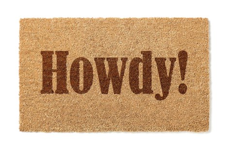 Howdy welcome mat isolated on A white background