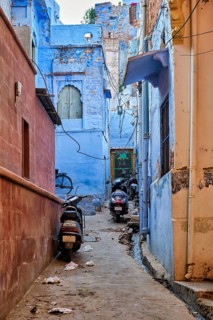 Bikes parked in indian streets of Jodphur also known as Blue City due to the vivid blue-painted Brahmin houses