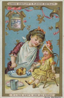 Picture series Girl playing with a doll: Now there is something to eat