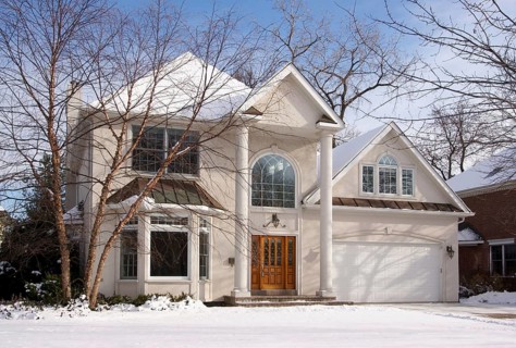 Majestic newly constructed home facade on a blustery day