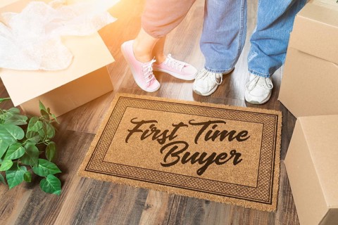 Man and woman unpacking near our first time buyer welcome mat
