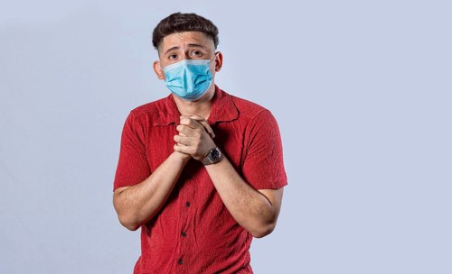 Latin man begging with medical protective face mask. pleading man concept isolated