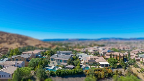Aerial view of populated neigborhood of houses with tilt-shift blur